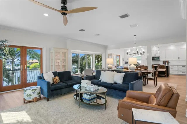 a view of a livingroom with furniture window and wooden floor