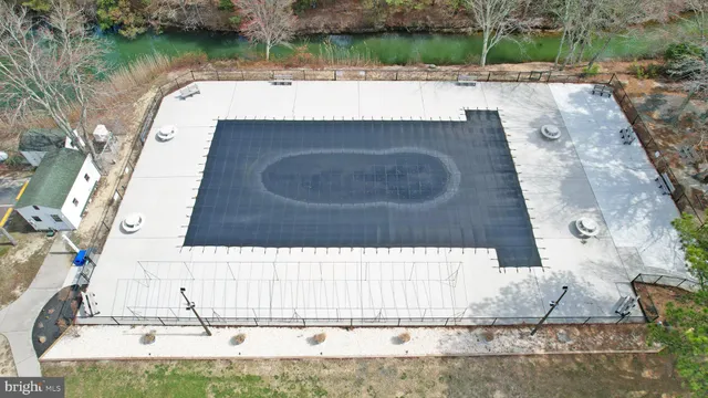an aerial view of a city with lake view