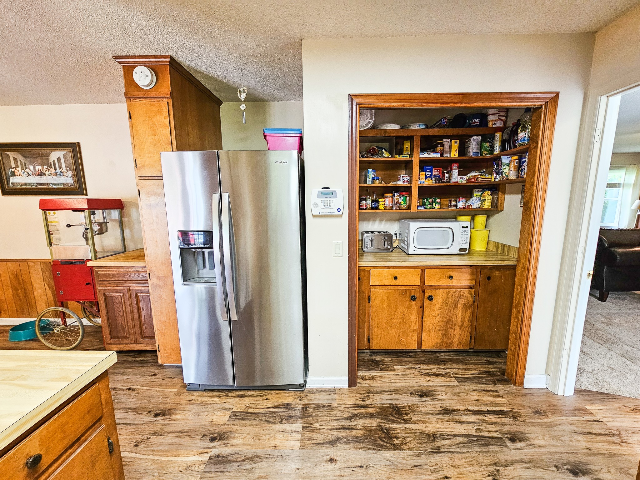 810 Rabbit Branch Road Shelbyville, TN 37160 - Photo 11 of 43 a view of a kitchen with fridge and wooden floor