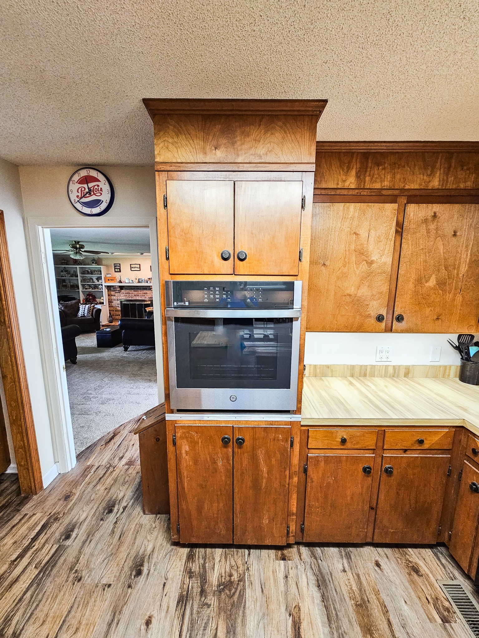 810 Rabbit Branch Road Shelbyville, TN 37160 - Photo 14 of 43 a living room with a bed and a fireplace