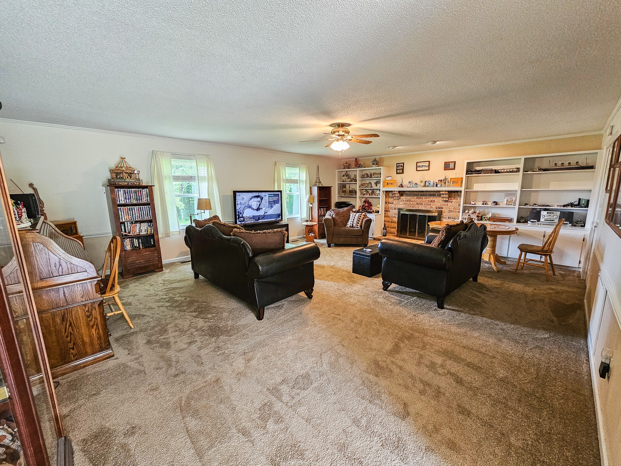 810 Rabbit Branch Road Shelbyville, TN 37160 - Photo 16 of 43 a living room with furniture and a flat screen tv