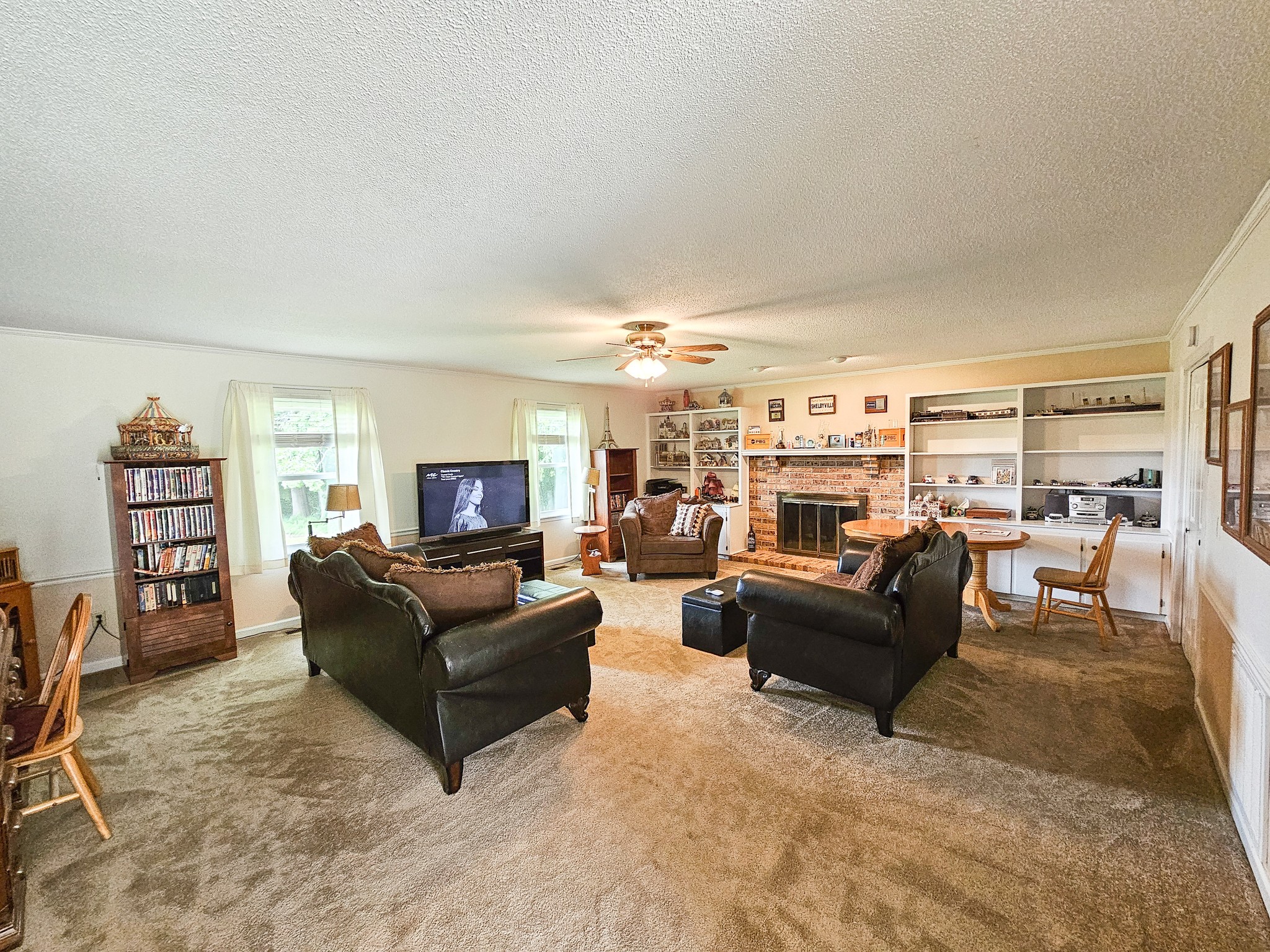 810 Rabbit Branch Road Shelbyville, TN 37160 - Photo 17 of 43 a living room with furniture and a flat screen tv