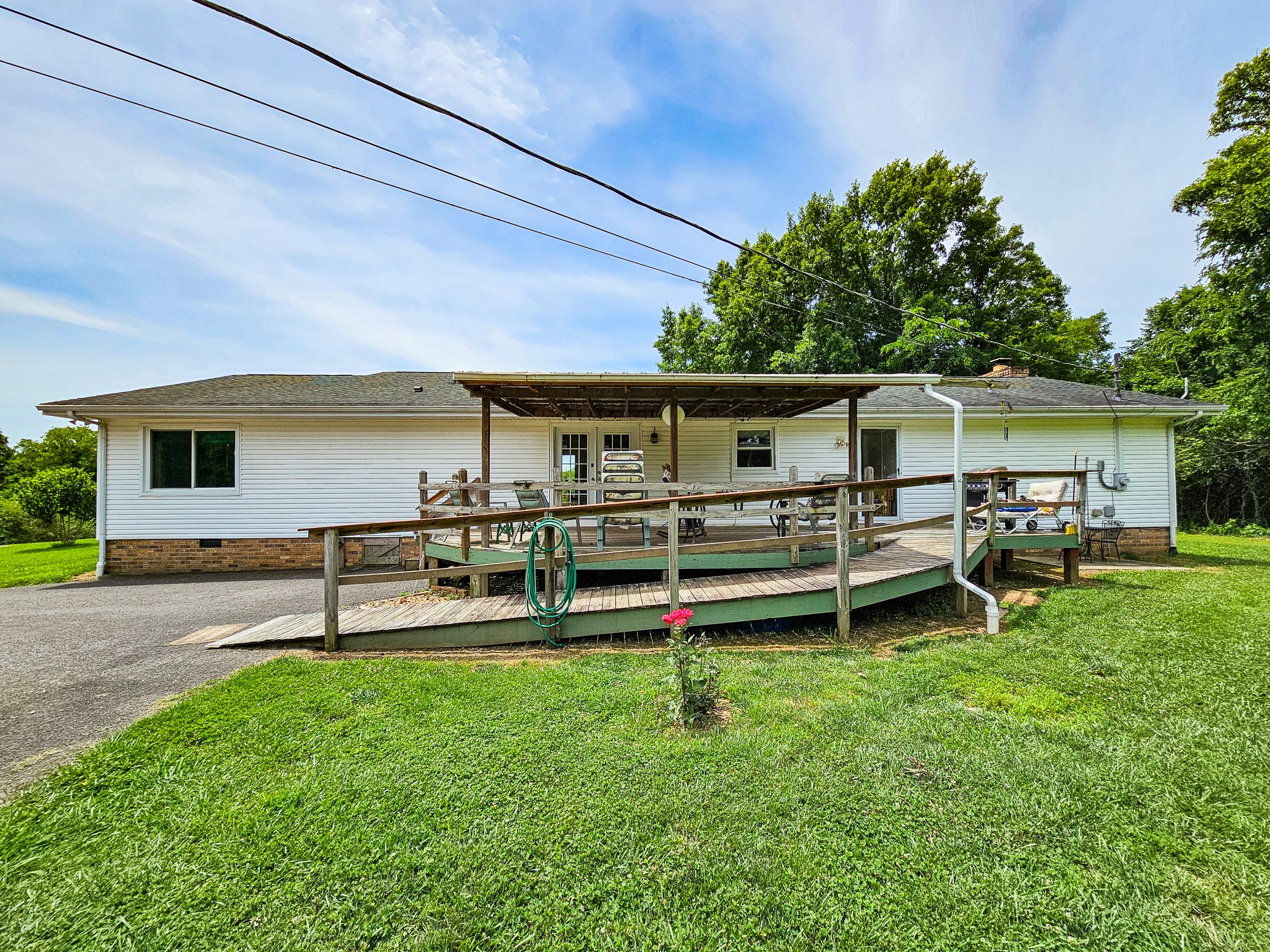 810 Rabbit Branch Road Shelbyville, TN 37160 - Photo 36 of 43 a backyard of a house with table and chairs