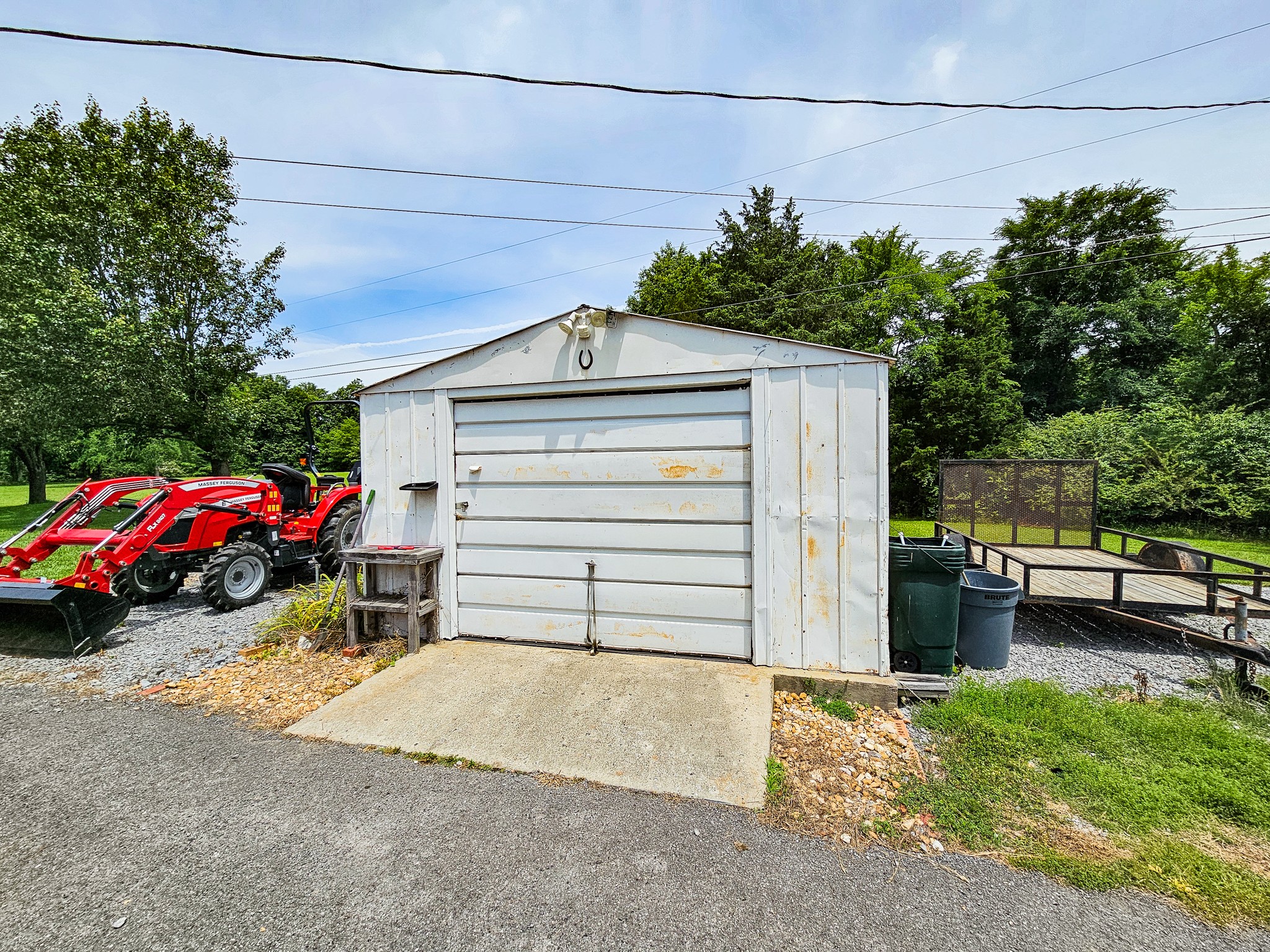 810 Rabbit Branch Road Shelbyville, TN 37160 - Photo 37 of 43 a view of a house with a yard and parking space