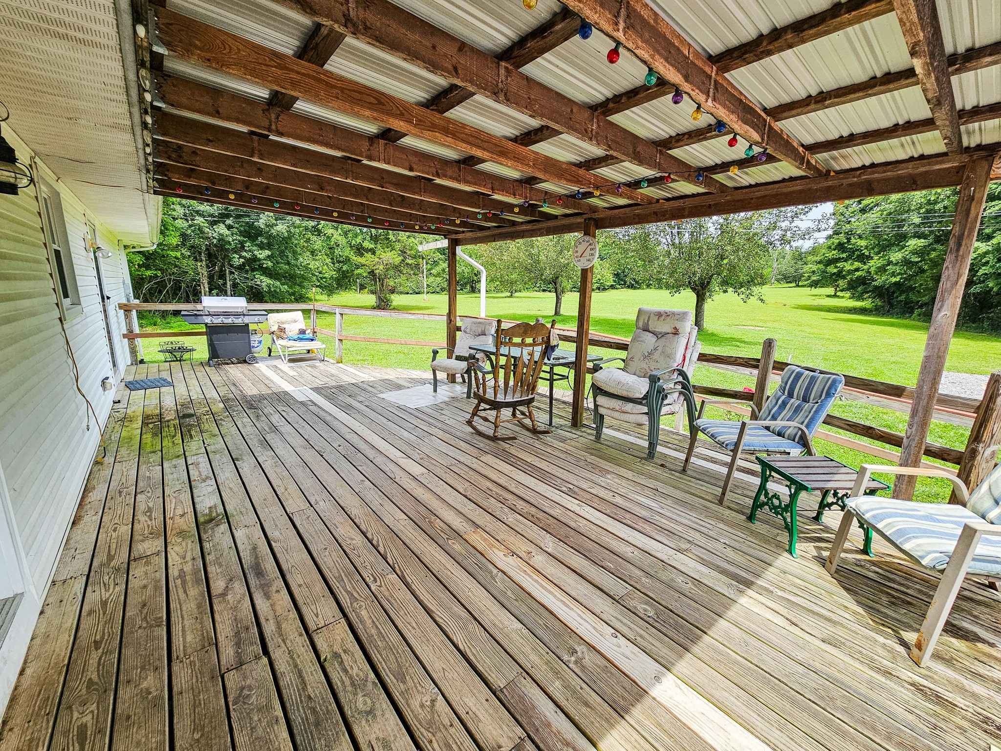 810 Rabbit Branch Road Shelbyville, TN 37160 - Photo 4 of 43 a view of a chairs and table on the wooden floor
