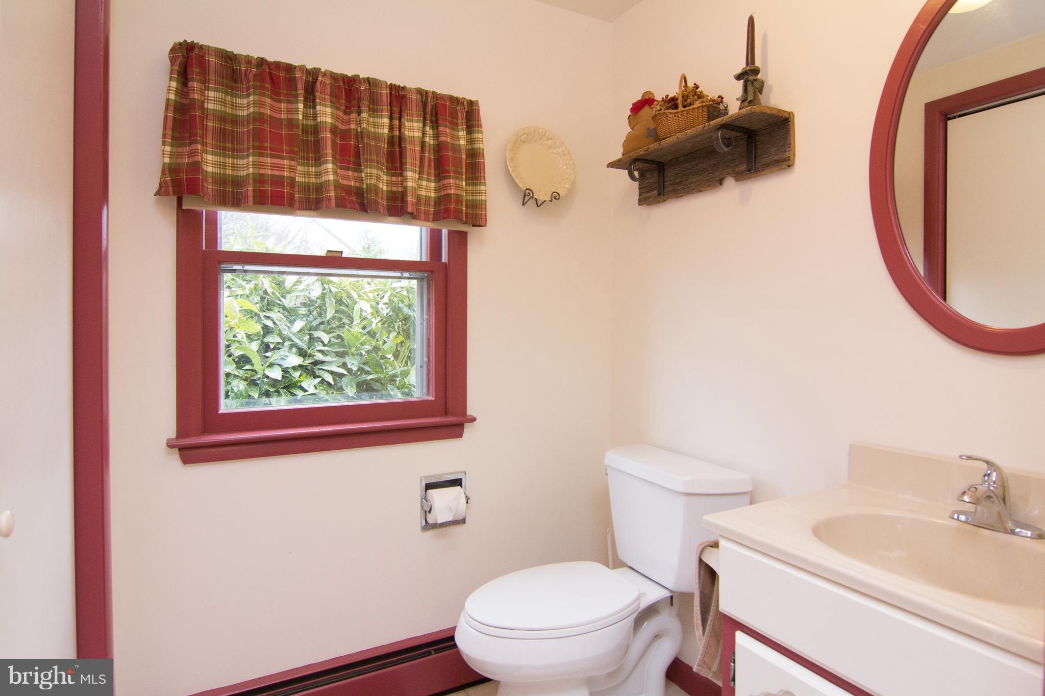 3358 Uniontown Road Westminster, MD 21158 - Photo 16 of 30 a bathroom with a toilet and a sink
