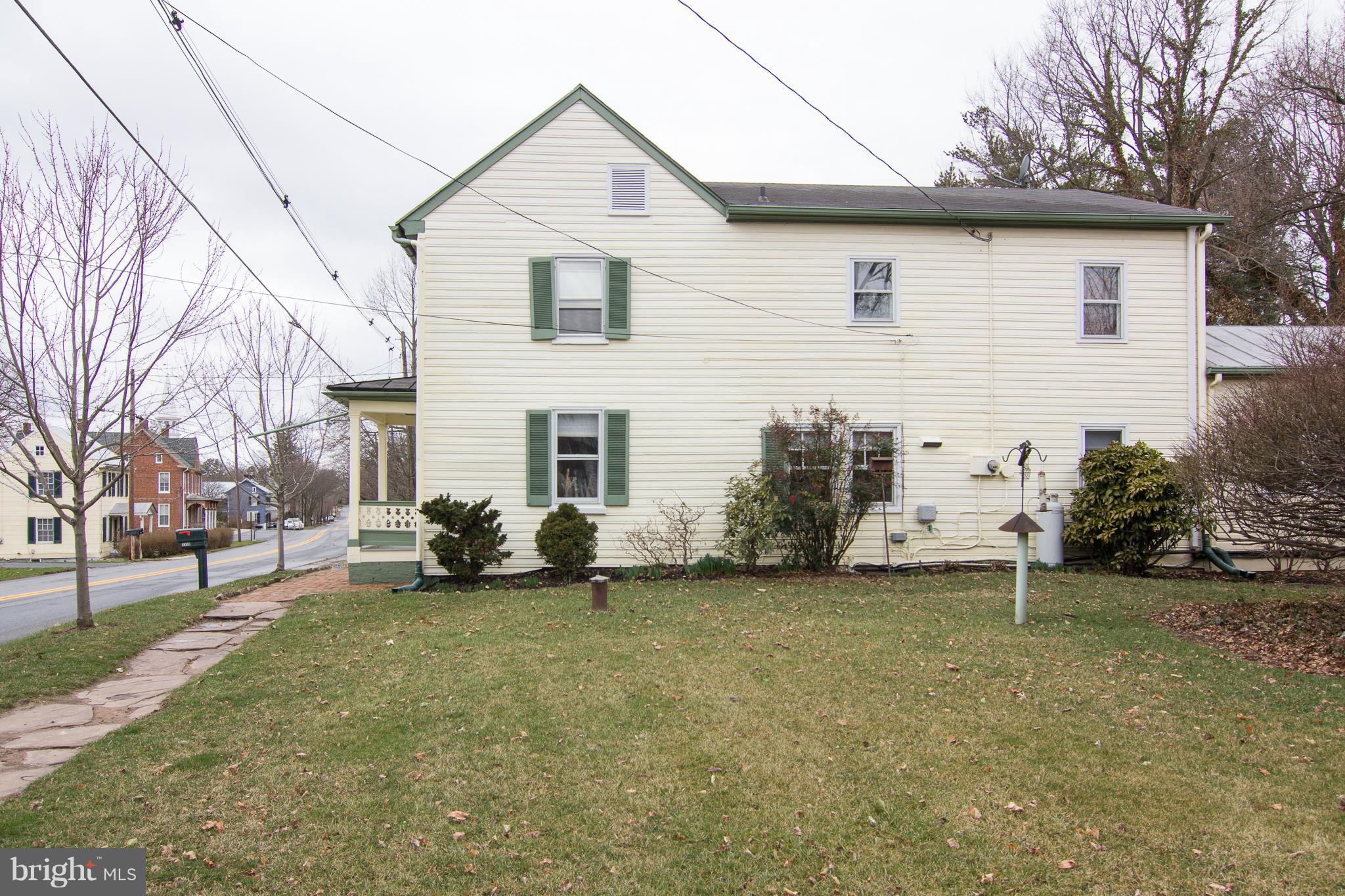 3358 Uniontown Road Westminster, MD 21158 - Photo 29 of 30 a view of a house with backyard and a tree