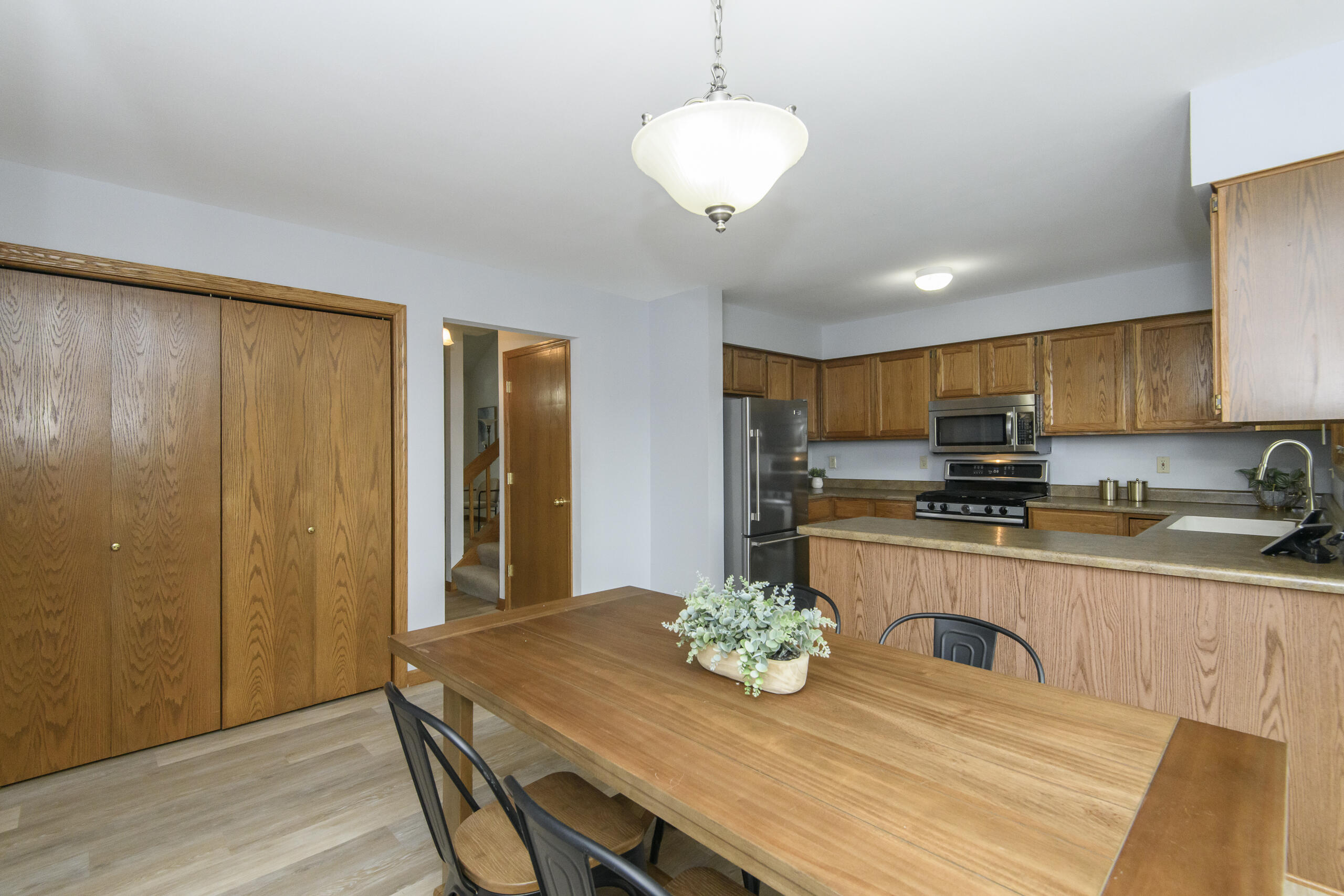 1215 Timber Ridge Pewaukee, WI 53072 - Photo 12 of 42 Bright Open Kitchen