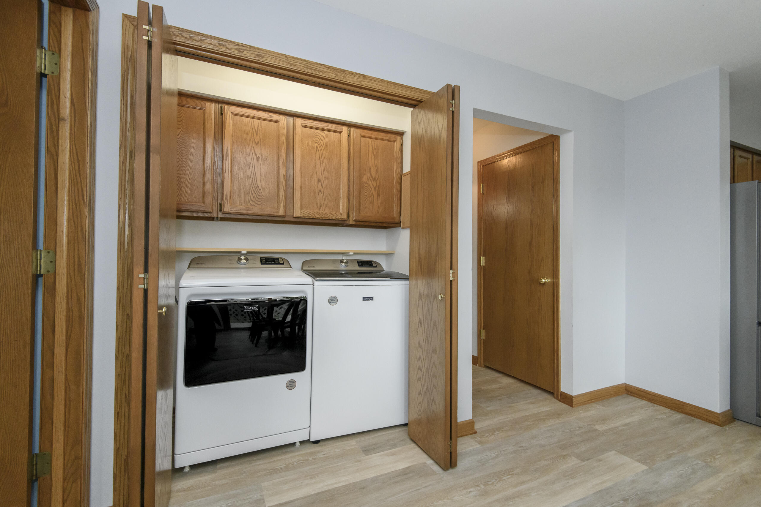 1215 Timber Ridge Pewaukee, WI 53072 - Photo 13 of 42 Main floor laundry