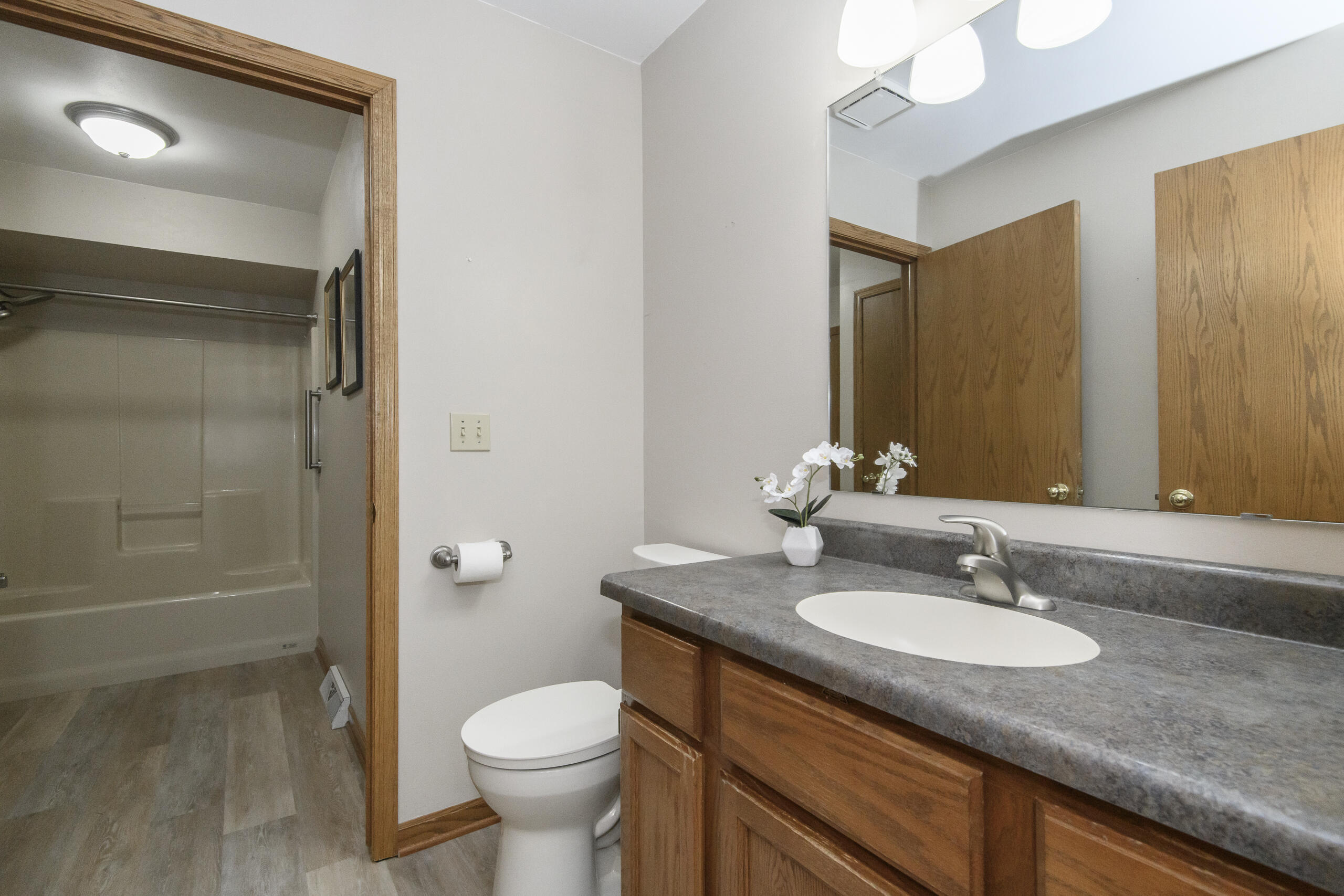 1215 Timber Ridge Pewaukee, WI 53072 - Photo 18 of 42 Main floor bathroom
