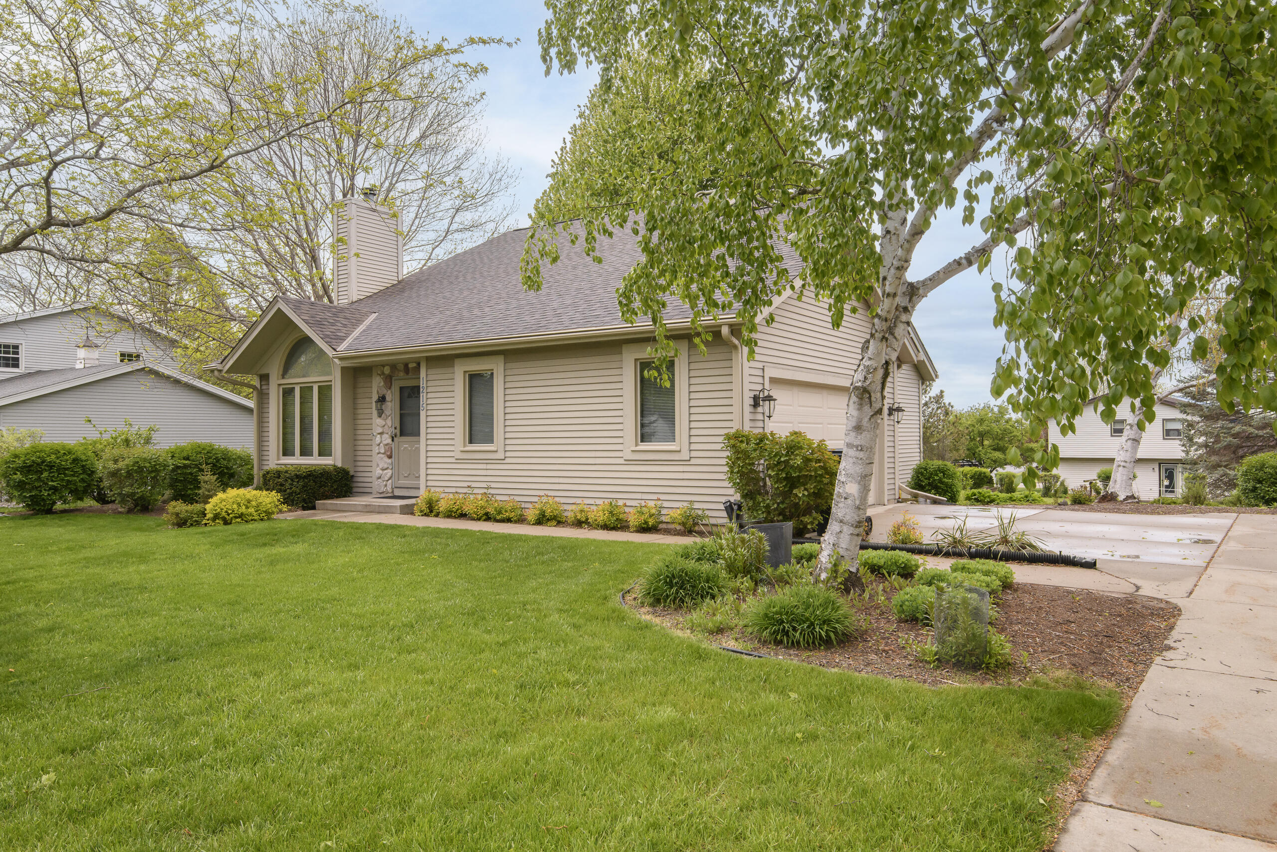 1215 Timber Ridge Pewaukee, WI 53072 - Photo 42 of 42 Nicely landscaped yard