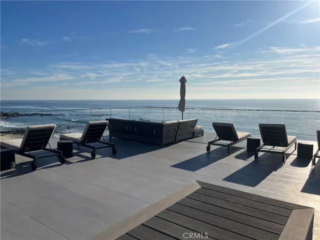 a view of a terrace with furniture and stove