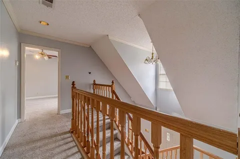 an empty room with a empty space and windows