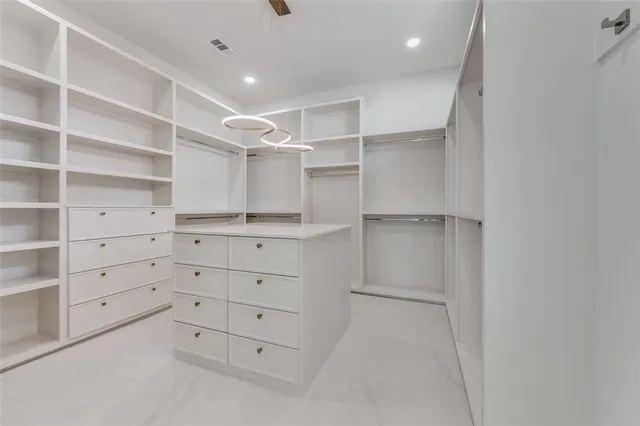a view of an empty walk in closet