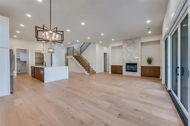 a view of a kitchen and a chandelier