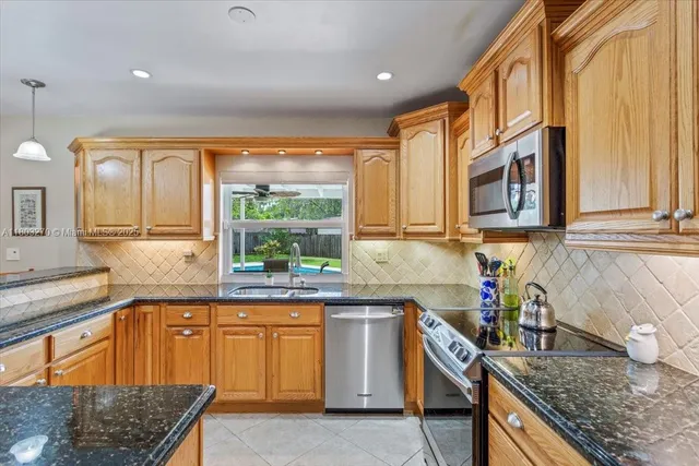 $1,160,000 | 9750 Southwest 143rd Drive, Miami, FL 33176