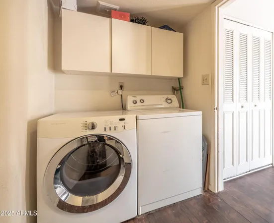 a utility room with dryer and washer