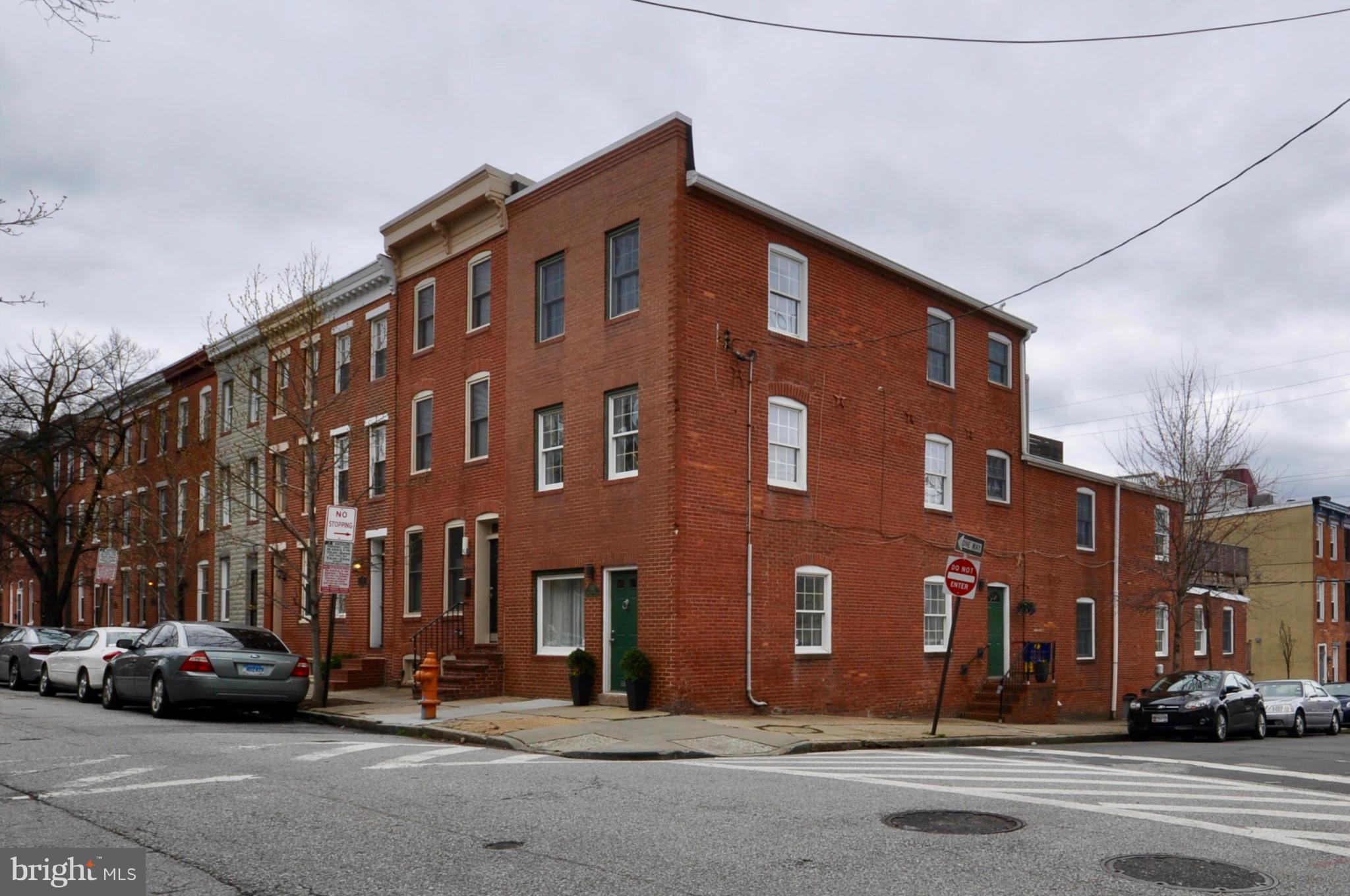 1200 Riverside Avenue Baltimore, MD 21230 - Photo 2 of 30 a view of a street that has couple of cars parked on the road