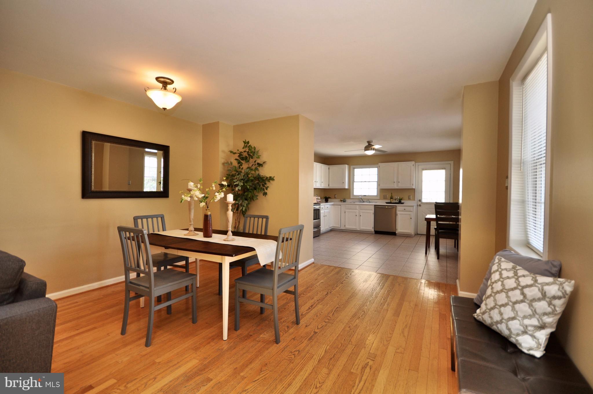 1200 Riverside Avenue Baltimore, MD 21230 - Photo 10 of 30 a view of a dining room with furniture and wooden floor
