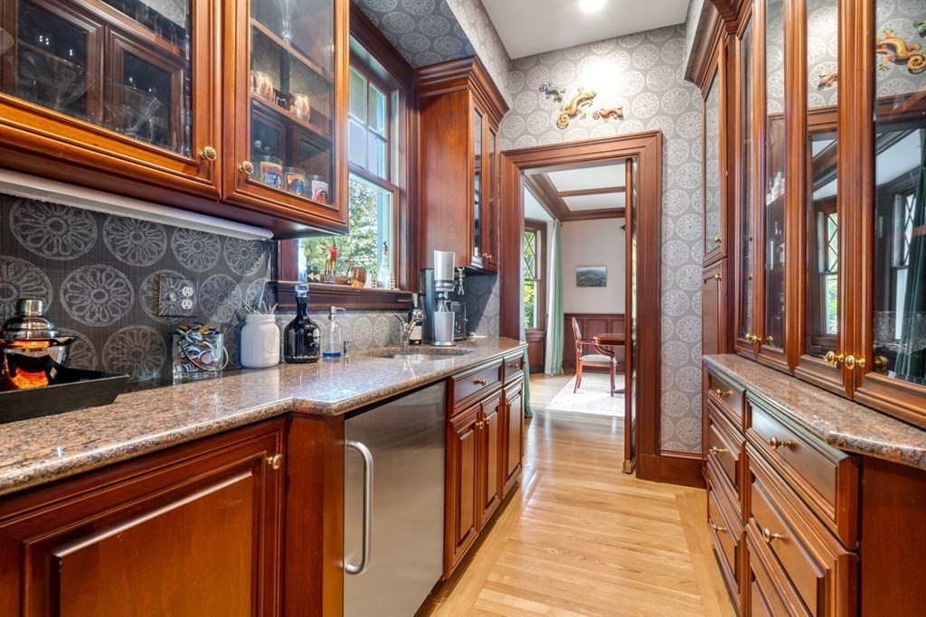 60 Abbott Road Wellesley, MA 02481 - Photo 6 of 40 a kitchen with stainless steel appliances granite countertop a sink and cabinets