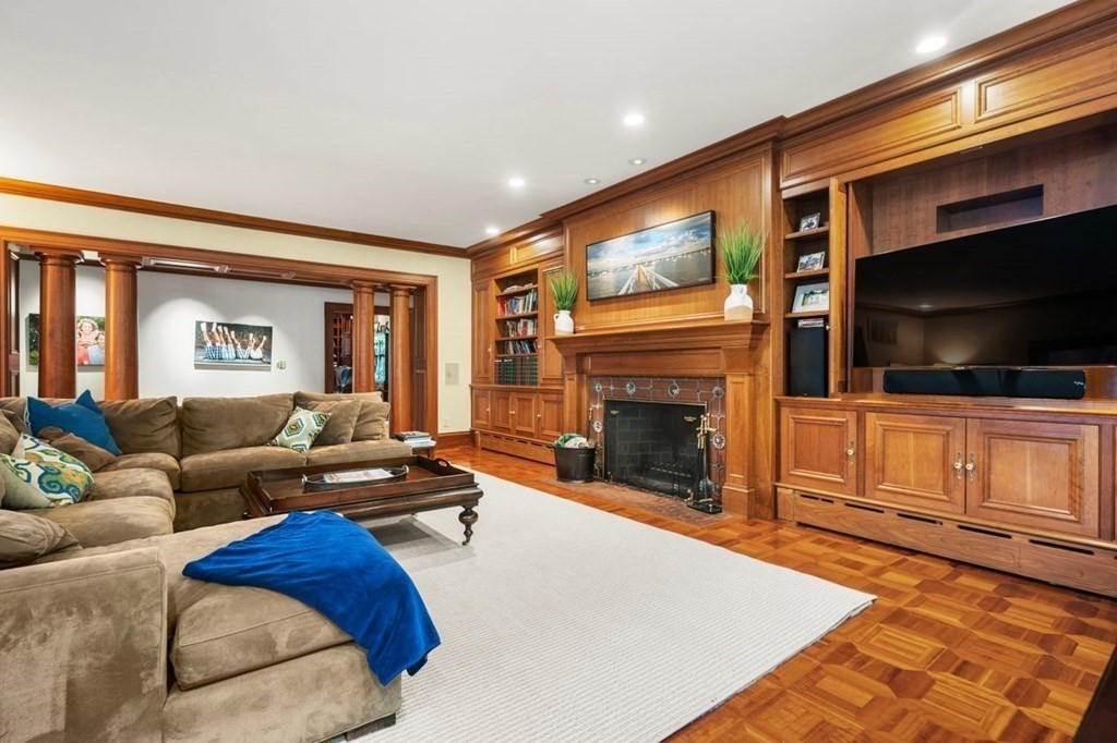 60 Abbott Road Wellesley, MA 02481 - Photo 10 of 40 a living room with furniture and a flat screen tv