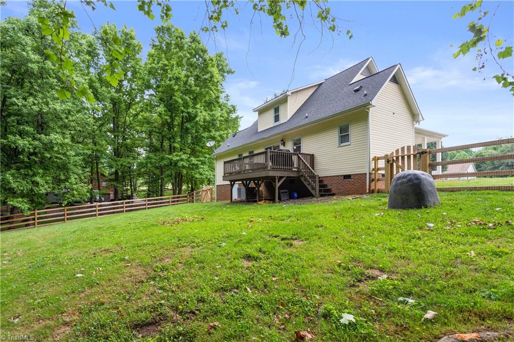 7105 Harper Ridge Court Oak Ridge, NC 27310 - Photo 20 of 23 Backyard view