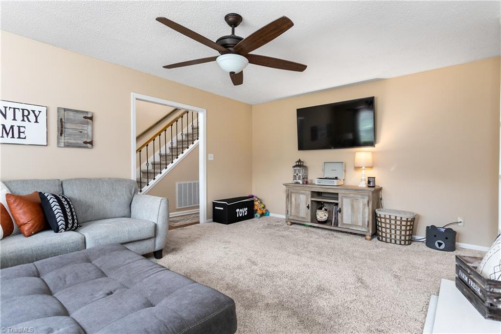 7105 Harper Ridge Court Oak Ridge, NC 27310 - Photo 6 of 23 Additional view of the den