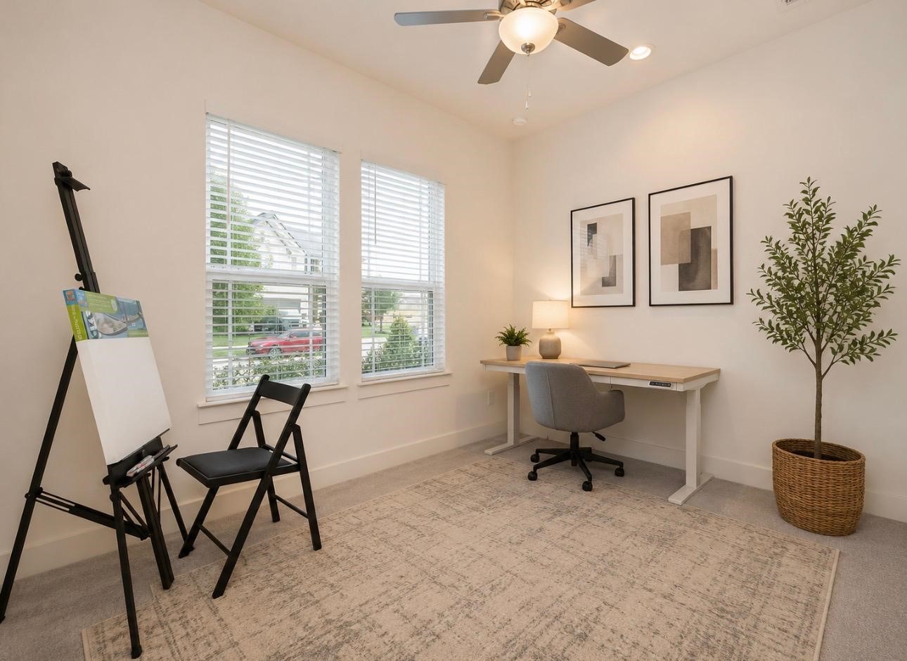 31915 Sky Rdg Lane Fulshear, TX 77441 - Photo 31 of 38 This beautifully staged secondary bedroom is also used as a second home office, enhanced with AI to showcase its full potential, offers a bright and inspiring workspace perfect for productivity and creativity.