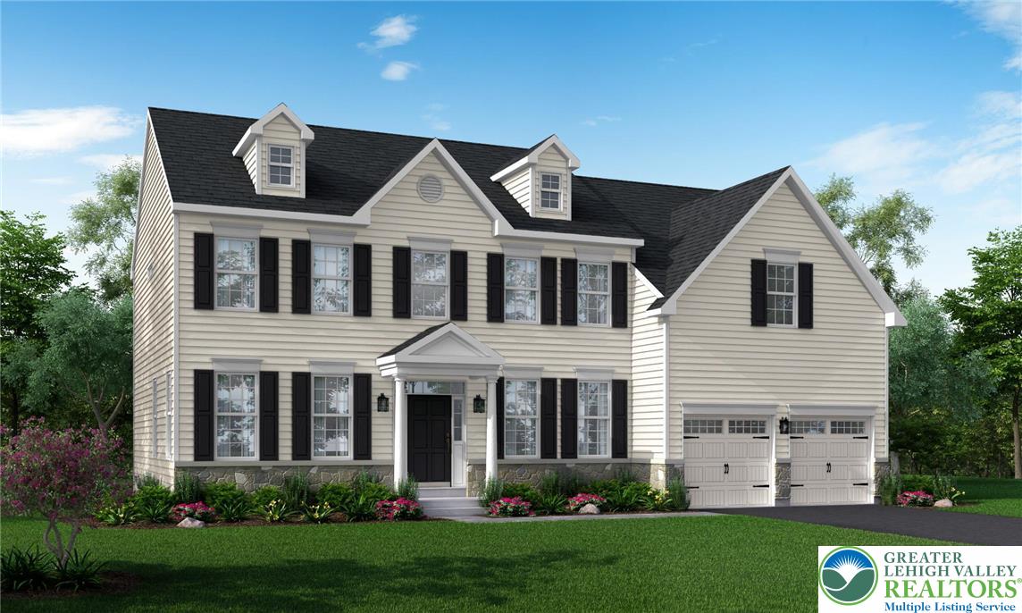 5137 Schantz Road, Unit THE JACKSON Allentown, PA 18104 - Photo 4 of 9 a front view of a house with a garden