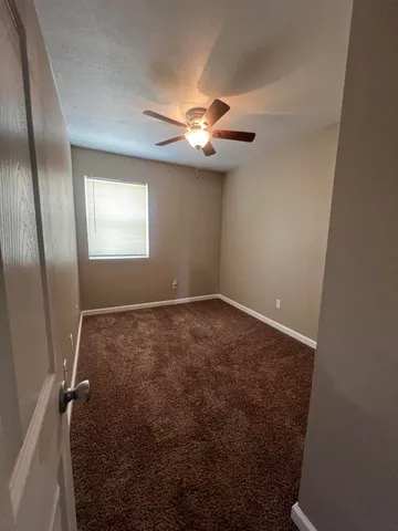 en empty room with windows