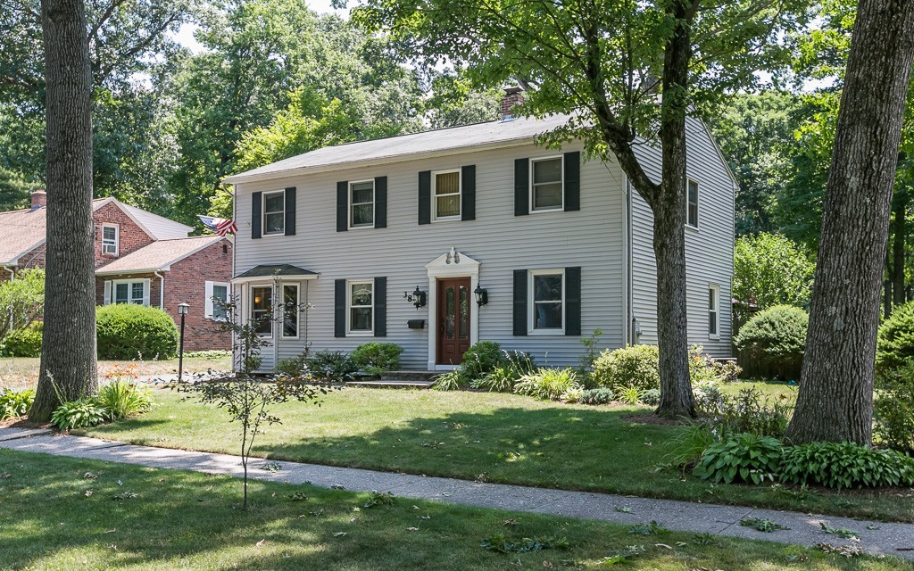 387 Maple Road Longmeadow, MA 01106 - Photo 23 of 27 a front view of a house with a yard