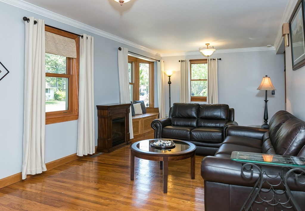 387 Maple Road Longmeadow, MA 01106 - Photo 5 of 27 a living room with furniture and a fireplace