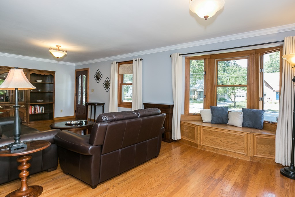 387 Maple Road Longmeadow, MA 01106 - Photo 6 of 27 a living room with furniture and a large window
