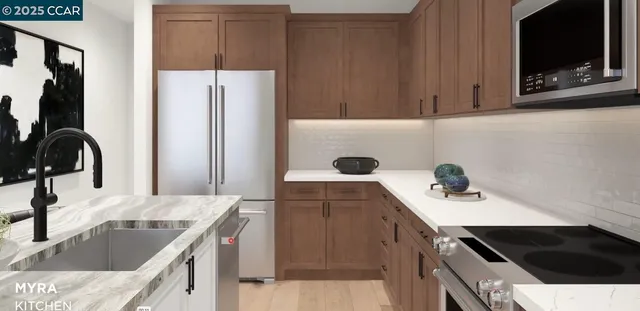 a kitchen with a sink stove and refrigerator