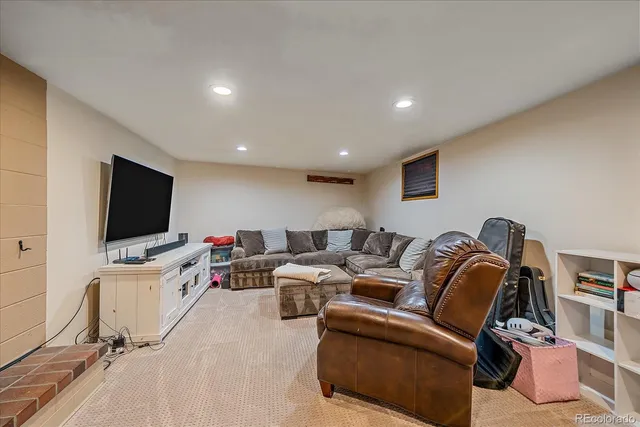 a bedroom with a bed and night stand