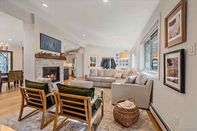 a view of a yard with wooden fence