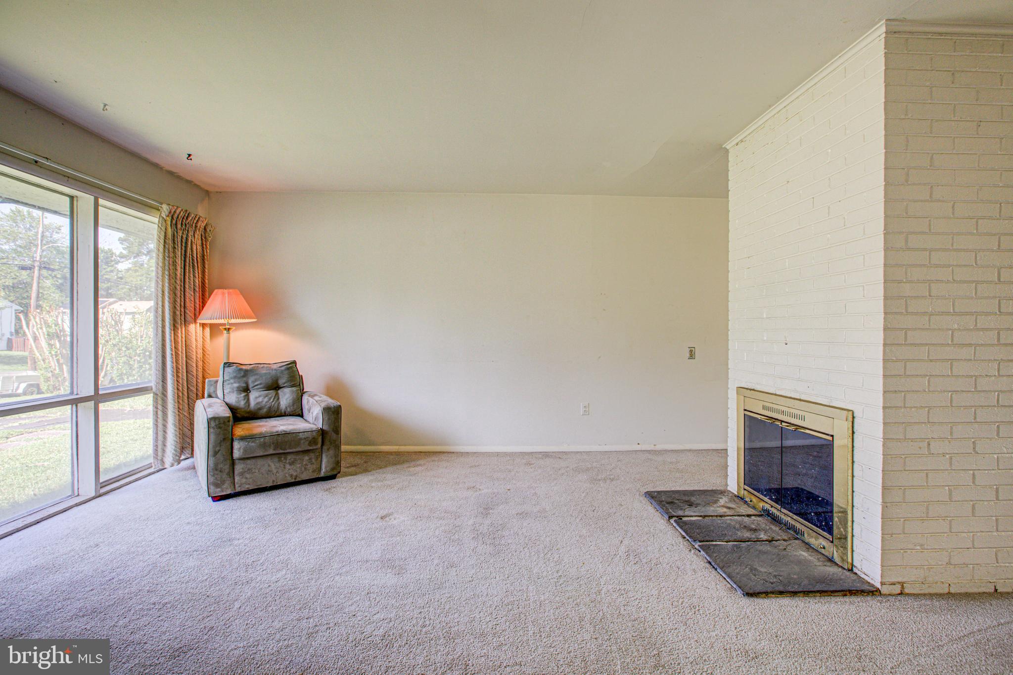 7420 Axton Street Springfield, VA 22151 - Photo 6 of 46 Wood Burning fireplace in living room