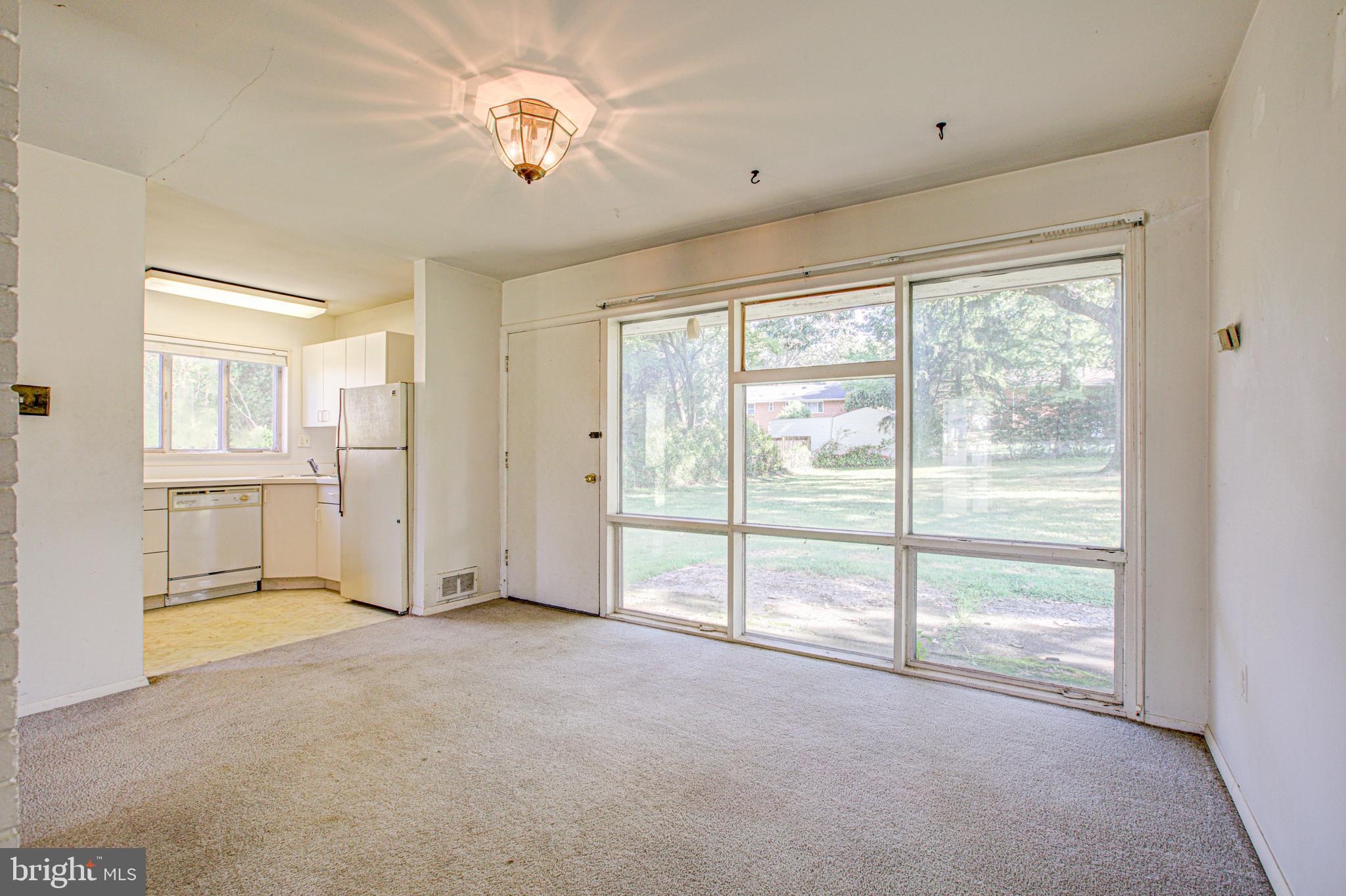 7420 Axton Street Springfield, VA 22151 - Photo 7 of 46 Dining room with great view of huge backyard