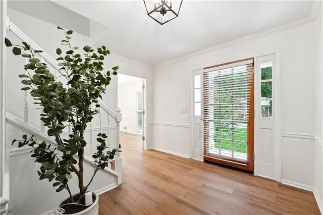 a view of a entryway with wooden floor