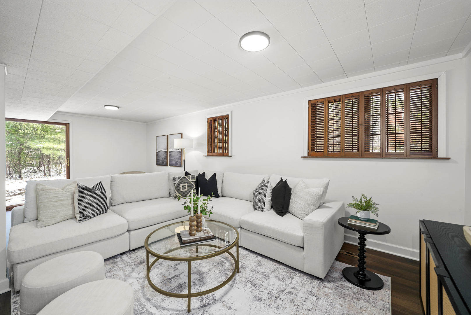 524 Forest Hill Road Lake Forest, IL 60045 - Photo 24 of 32 a living room with furniture a rug and a large window