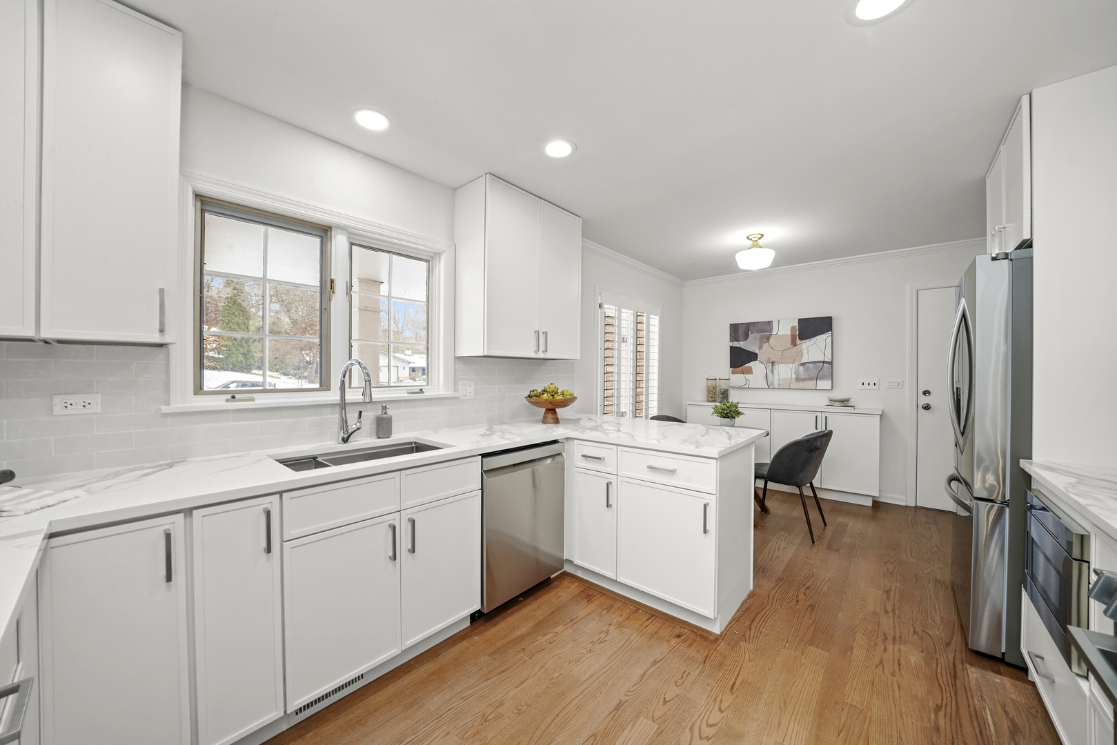 524 Forest Hill Road Lake Forest, IL 60045 - Photo 5 of 32 a kitchen with a sink cabinets stainless steel appliances and windows