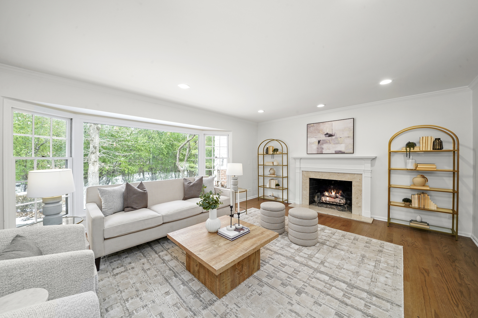 524 Forest Hill Road Lake Forest, IL 60045 - Photo 9 of 32 a living room with furniture a fireplace and a floor to ceiling window