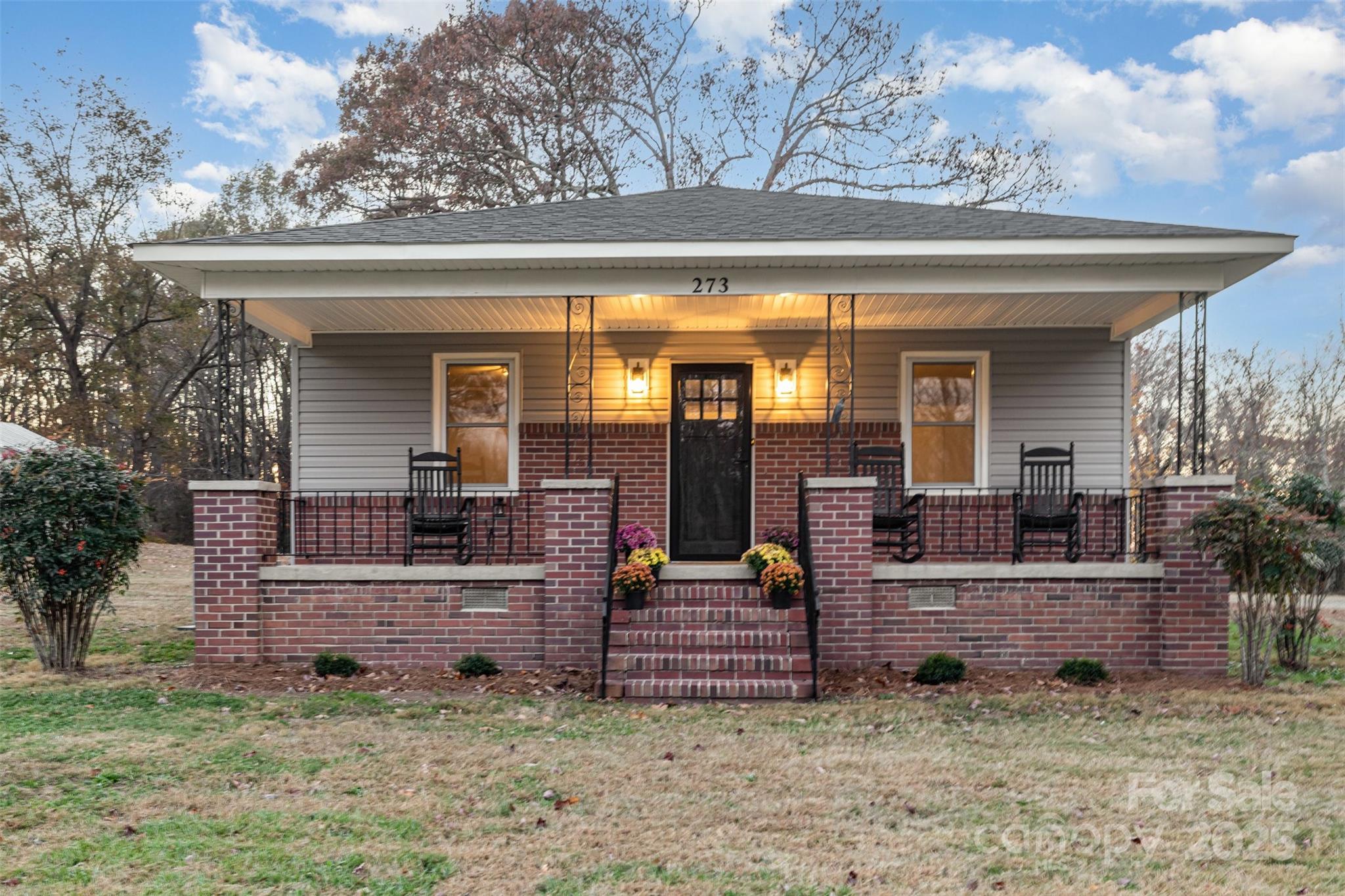 273 Stanley Spencer Mountain Road Gastonia, NC 28056 - Photo 3 of 17 a view of a house with a outdoor seating area