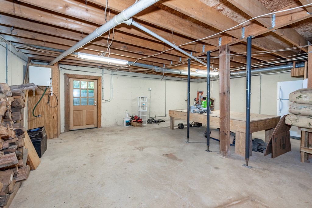 168 Burnt Mountain Cove Road Jasper, GA 30143 - Photo 41 of 53 a view of a room with gym equipment