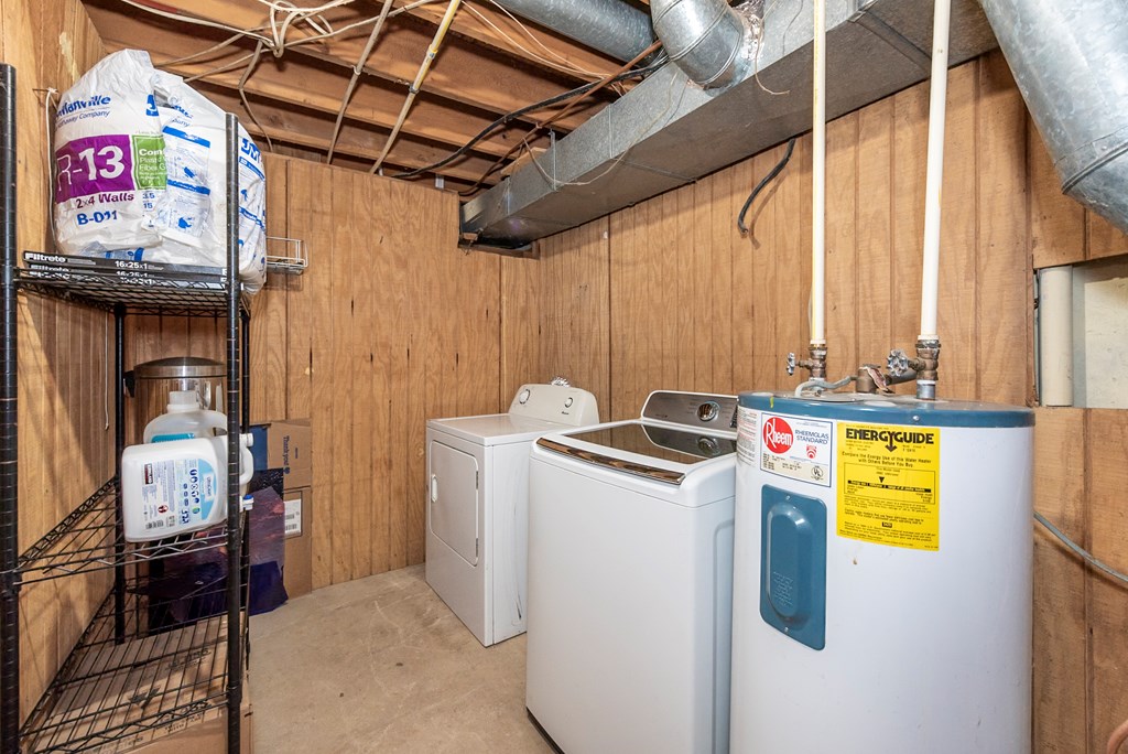 168 Burnt Mountain Cove Road Jasper, GA 30143 - Photo 42 of 53 a utility room with dryer and washer