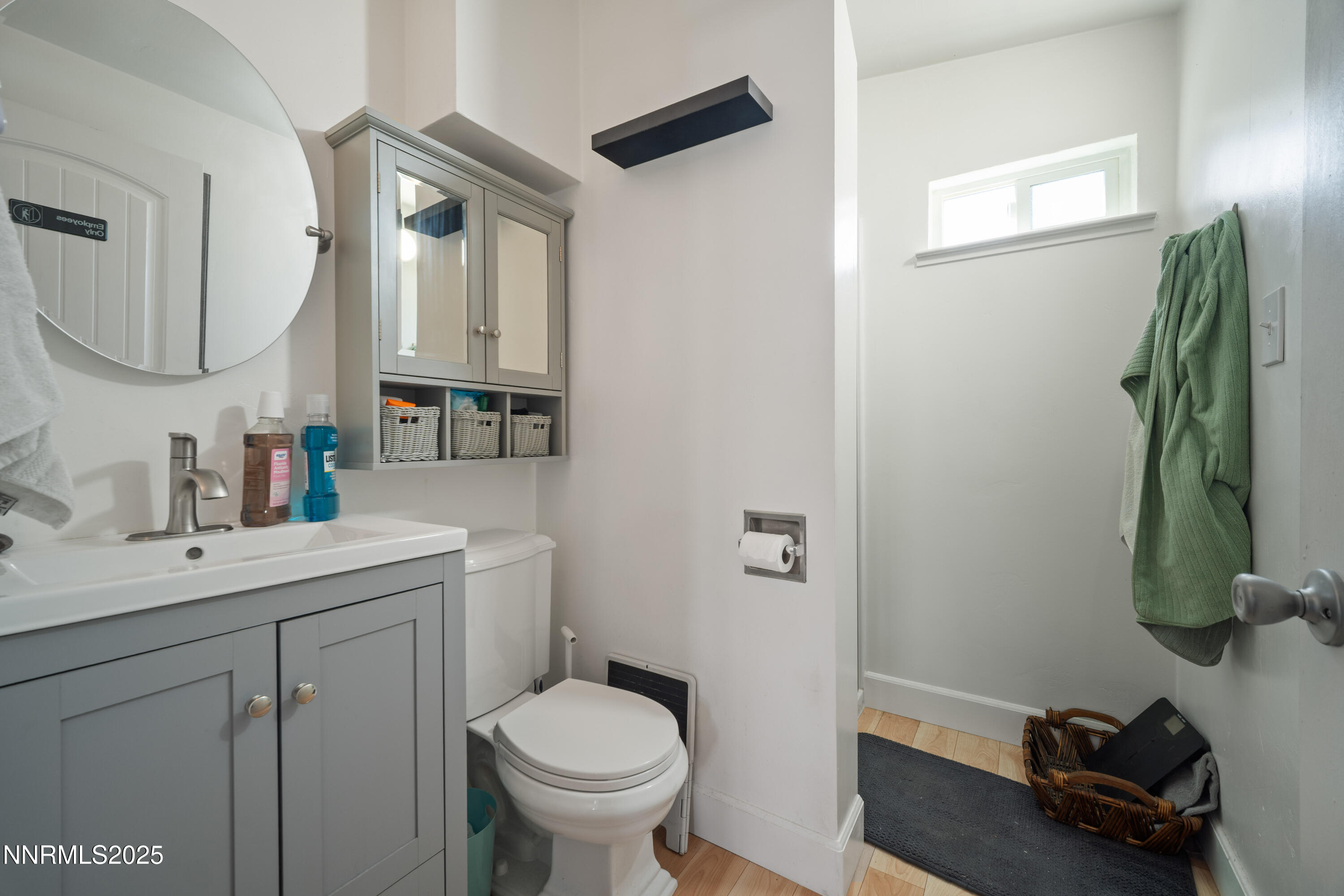 425 Main Street Silver City, NV 89428 - Photo 24 of 27 a bathroom with a sink a toilet and mirror