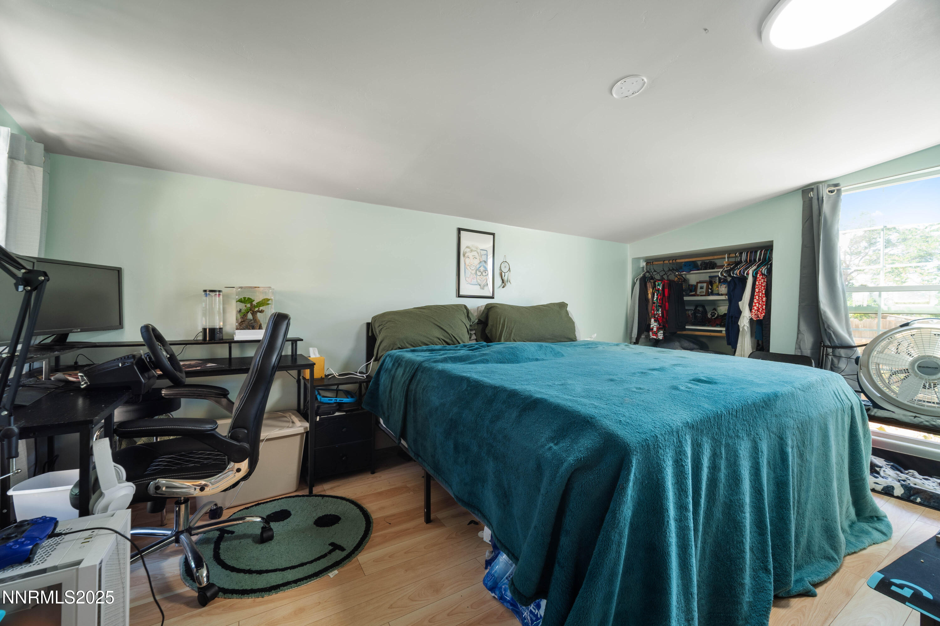 425 Main Street Silver City, NV 89428 - Photo 25 of 27 a bed room with a bed and a gym machine
