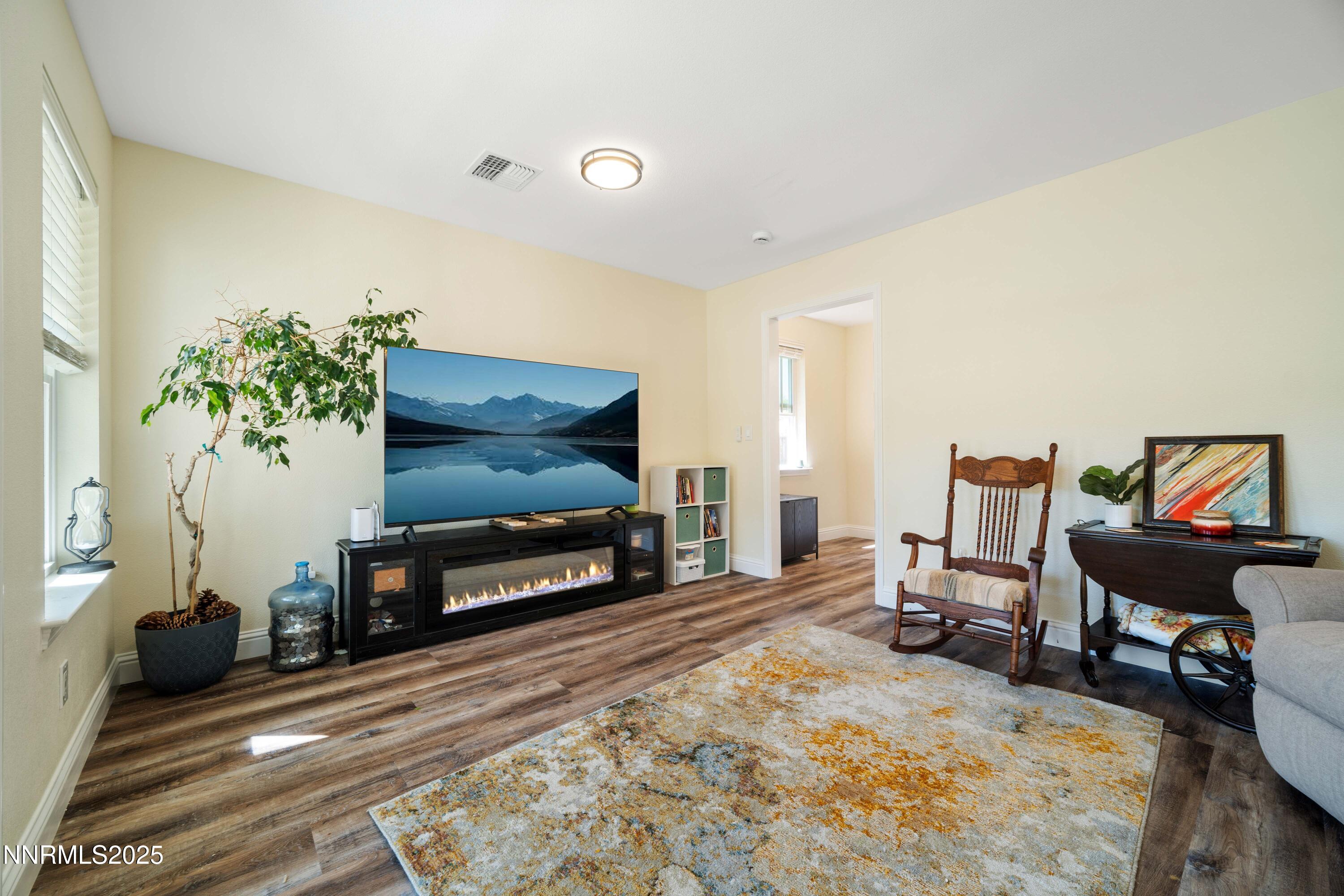 425 Main Street Silver City, NV 89428 - Photo 3 of 27 a living room with furniture and a fireplace