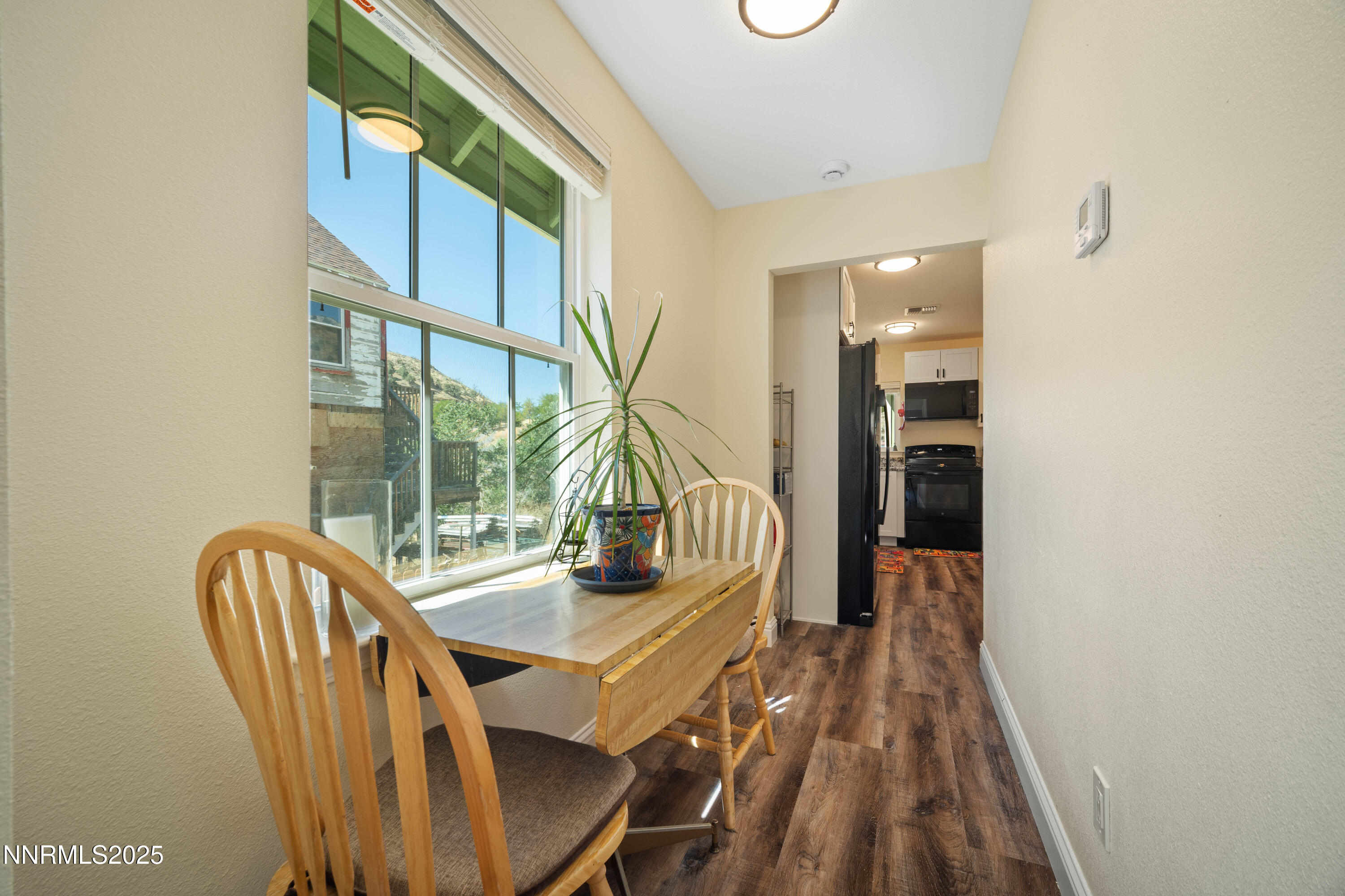 425 Main Street Silver City, NV 89428 - Photo 6 of 27 a view of a dining room with furniture window and outside view