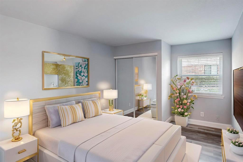 2240 Tarpley Road, Unit 464 Carrollton, TX 75006 - Photo 11 of 18 a bedroom with a bed and a potted plant